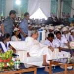 Chief minister Naveen Pattnaik interacts with school children at state level children's day festival in Bhubaneswar on Tuesday.
