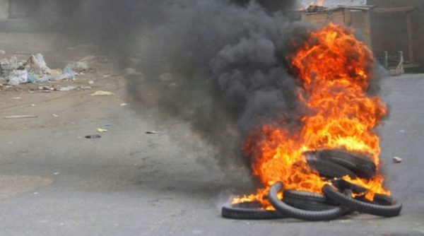 bandh burning tyres