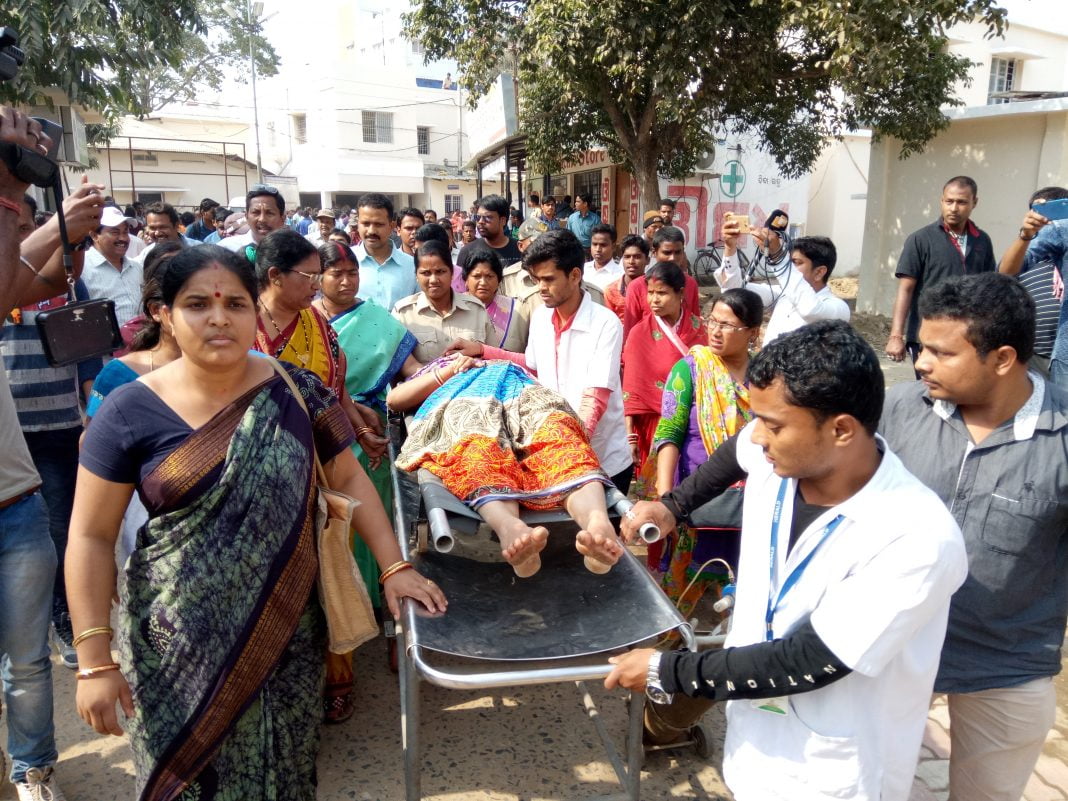 Rajashree Kamila being taken on a stretcher. Photograph: Odishabytes