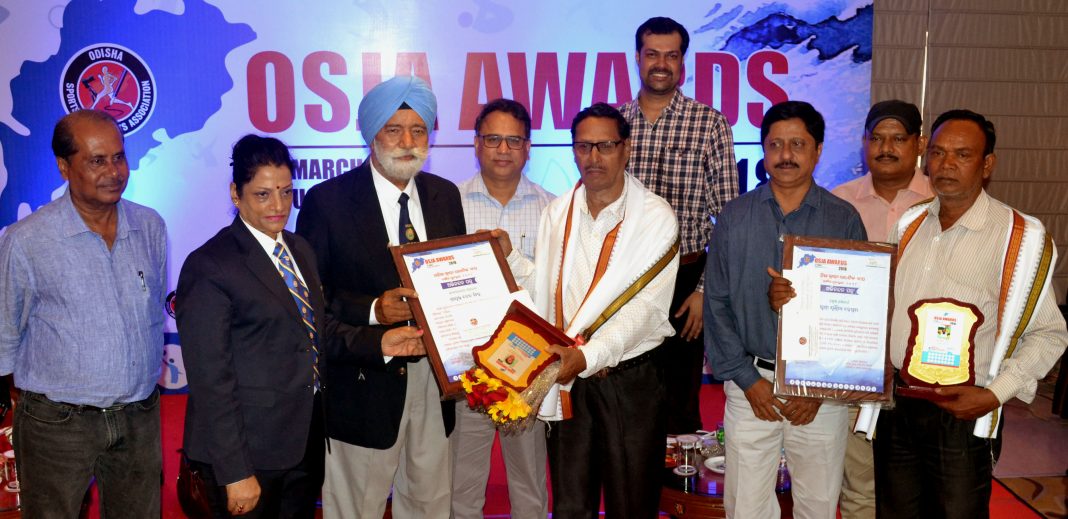 OSJA Awards recipients with guests and OSJA office-bearers in Bhubaneswar on Wednesday.