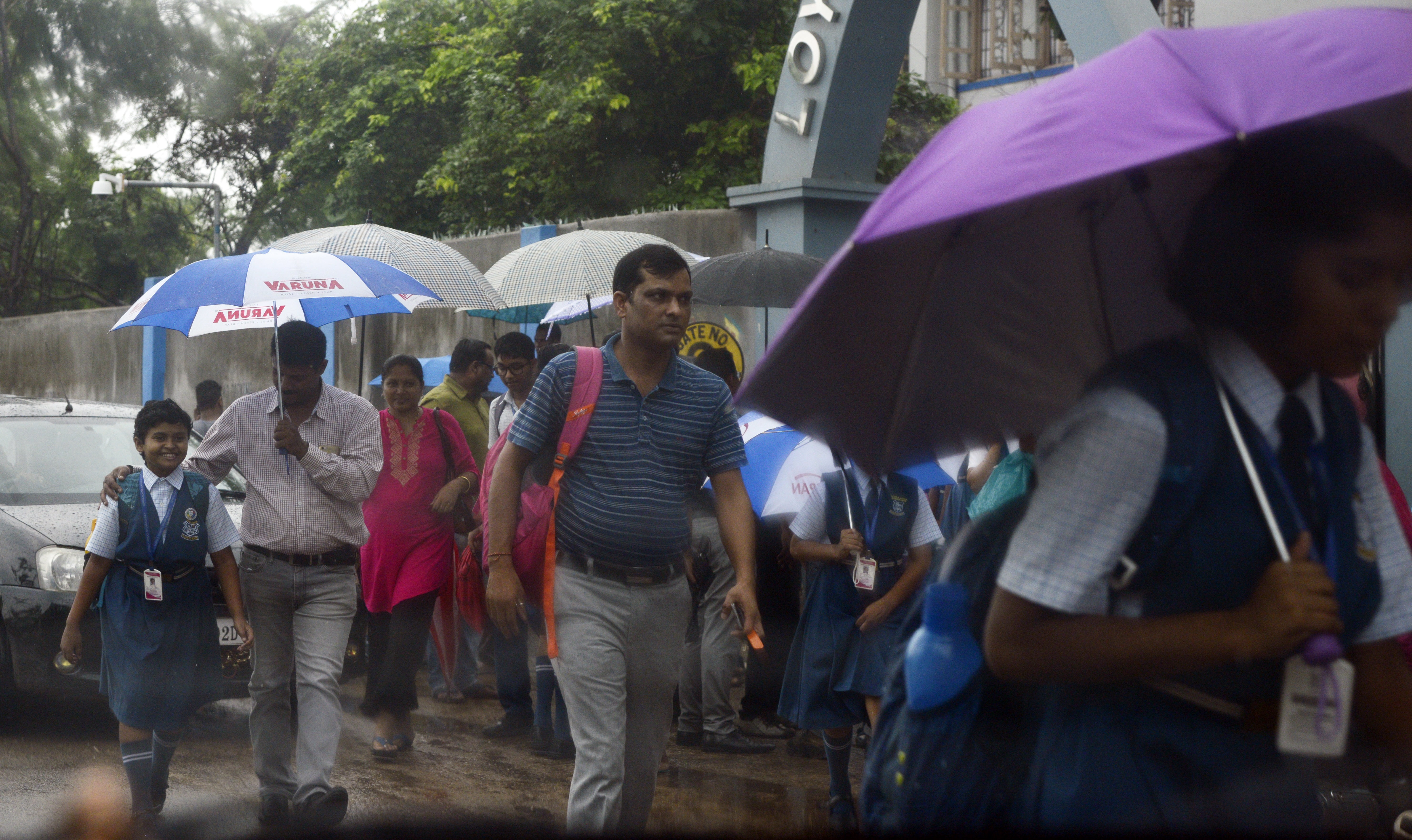 WAIT OVER: Umbrellas come out as rain lashes Bhubaneswar on Thursday. The India Meteorological Department (IMD) has issued heavy to very heavy rainfall warning for Odisha with a cyclonic circulation all set to turn into a low-pressure area over the Bay of Bengal within 24 hours. OB Photograph