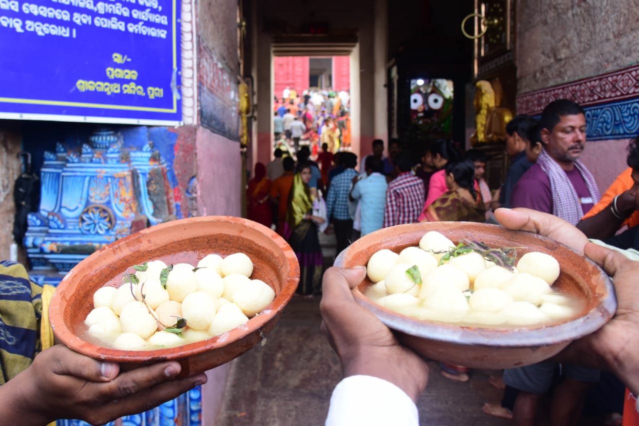 SWEET VICTORY: People offer Rasagola to Lord Jagannath in Puri after Chennai-based GI registry issued formal certification for 'Odisha Rasagola' on Monday. OB Photograph