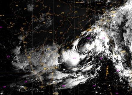 well-marked low pressure depression IMD heavy rainfall coastal Odisha