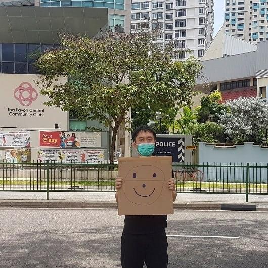 activist charged smiley protest