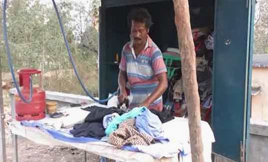 This Laundryman Of Odisha Irons Clothes With LPG! - odishabytes