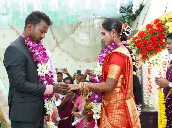 Engagement Ring Ceremony Indian Hindu Male Putting Ring On Brides Decorated  Finger Couple Is Well Attired As Per Traditional Indian Hindu Wedding Groom  Wearing Jodhpuri Suit And Floral Garland Stock Photo -