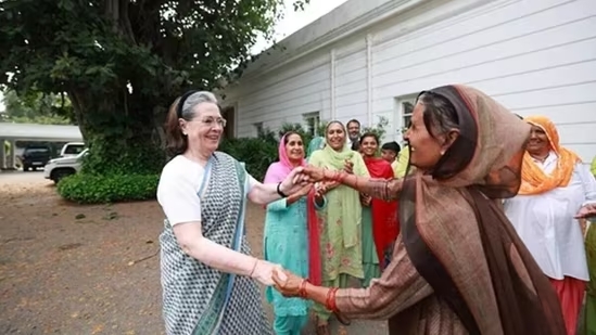 Sonia dances with farmers